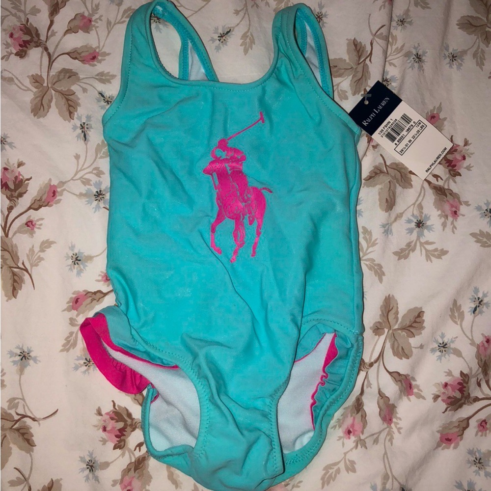 Ralph Lauren swimsuit with ruffled detail on hips and a clasp back